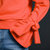 七格格 2017春装新款 喇叭袖系带刺绣爱心宽松套头长袖卫衣女N386(橙红色 M)第3张高清大图