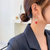 日韩国气质长款蝴蝶结水晶耳环女个性显脸瘦红球流苏耳坠耳线耳钉第4张高清大图