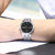 天梭(TISSOT)瑞士手表 海星恒意系列全自动机械双日历带夜光钢带男士腕表T065.430.11.031.00(黑盘银壳钢带)第4张高清大图