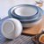 日式陶瓷米饭碗碟创意菜盘子咖啡杯简约蓝色边缘马克杯时尚餐具(雪花釉咖啡杯（送勺） 默认版本)第4张高清大图