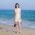 2018夏季新款韩版女装修身显瘦无袖气质娃娃领流苏连衣裙短裙裙子(米白色)(L)第3张高清大图