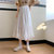 半身裙2021新款春夏季中长款高腰A字裙设计感荷叶边初恋白色裙子(紫色7864 XL)第4张高清大图