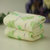 【纯棉柔软，超强吸水】洁丽雅（GRACE）T001-T1纯棉素色割绒印花童巾组合（2条装）（黄色+绿色）（50*27cm）第3张高清大图
