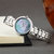 天梭(TISSOT)瑞士手表 弗拉明戈系列小巧简约钢带石英女表T094.210.11.111.00(蓝盘银钢带)第5张高清大图