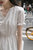 法式白色连衣裙女夏季小众设计裙子质感v领小个子长款长裙(杏色 XXL)第4张高清大图