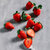 【顺丰空运】丹东红颜草莓脆嫩多汁果香浓郁色泽红润(大果30g 2斤装（净重1.9）)第3张高清大图