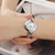 天梭(TISSOT)瑞士手表 弗拉明戈系列 贝母盘女表 时尚潮流小巧简约石英腕表T094.210.11.111.00(白盘银钢带)第5张高清大图