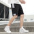 卡郎琪 沙滩裤男五分裤2020新款夏季外穿拼接运动裤潮学生大码男士休闲裤(KXP-S17黑色 XL)第2张高清大图