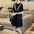 欧洲站赫本风黑色短袖连衣裙女气质高端显瘦荷叶边裙夏装新款(黑色 M)第2张高清大图