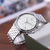 天梭(TISSOT)瑞士手表 俊雅经典系列六针多功能时尚商务钢带石英男表T063.617.11.067.00(白盘钢带)第3张高清大图